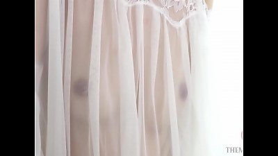 seduces in nipple-skimming horny clothing